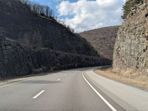 1 Hospitalized After Vehicle Crashes Into Apartment Building at Orange St & Sweetzer Ave
